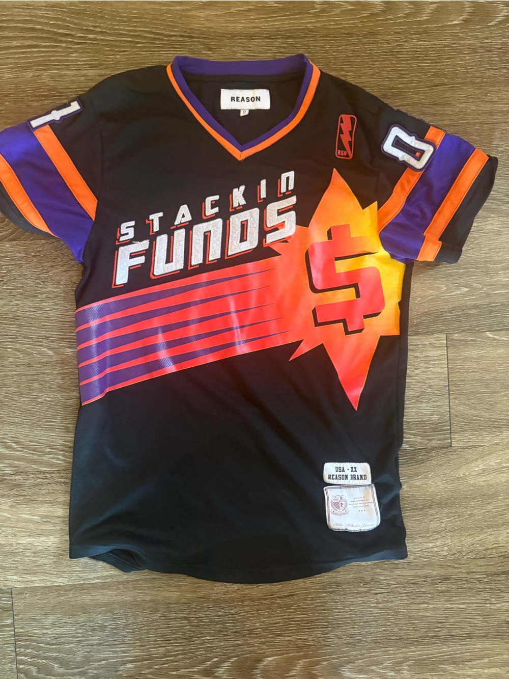 Reason Men’s "Stackin Funds" Black Graphic Jersey Top